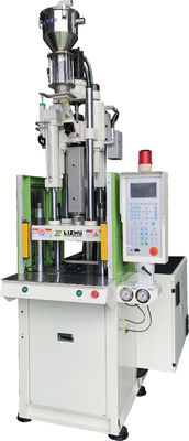 Macchina per lo stampaggio a iniezione verticale per il processo di stampaggio di inserti di plastica